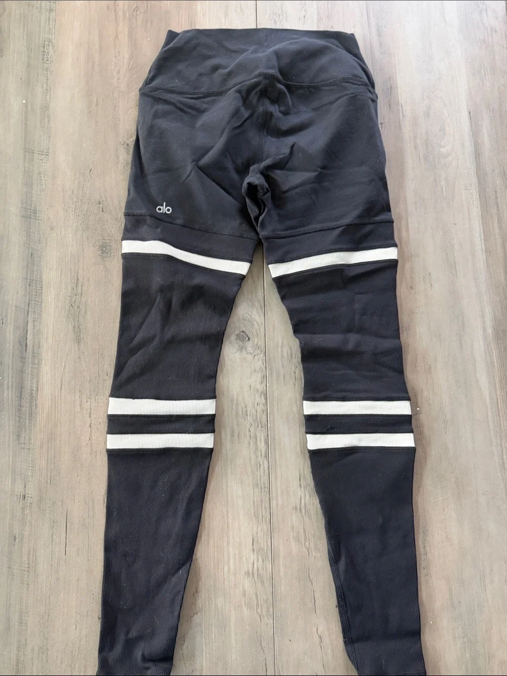 Alo Medium Ribbed Black Leggings with White Striped Knee Details - Picture 9 of 11